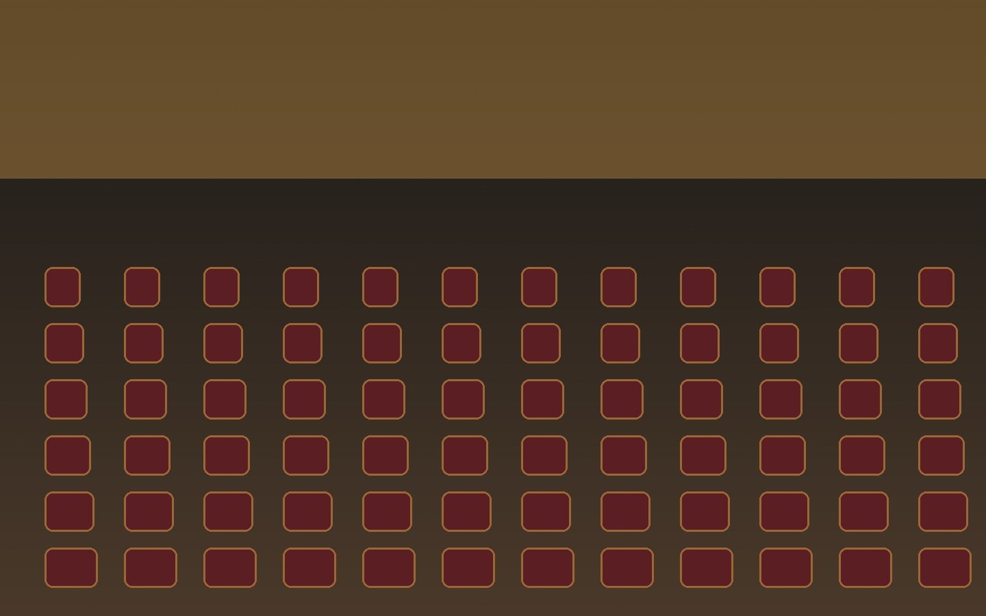 Rows of empty seats facing a softly lit stage